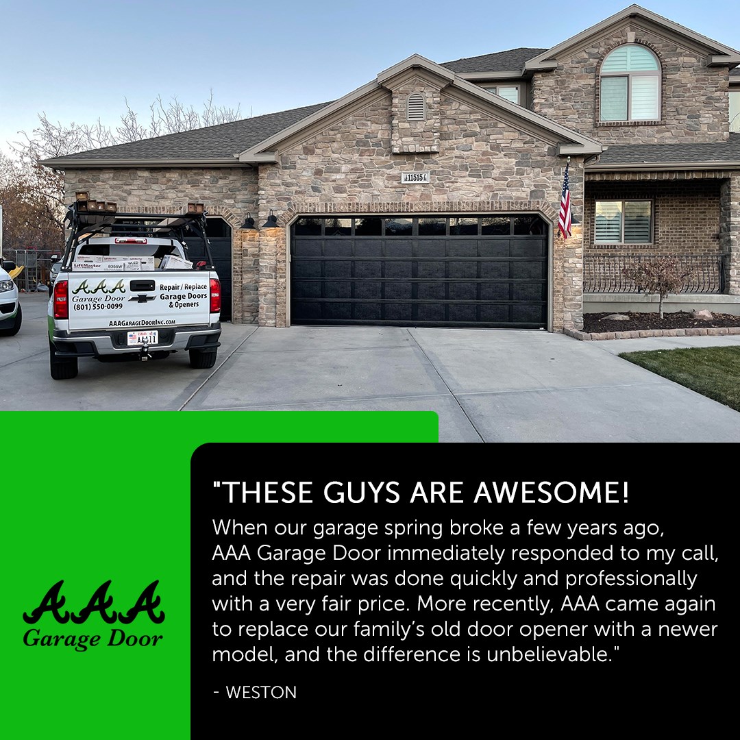 a house with a garage door and a van 