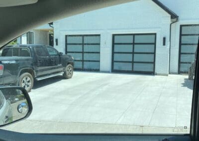 a truck parked outside a garage