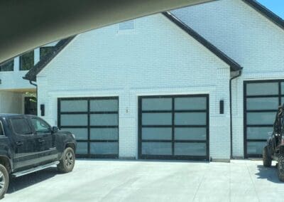 a truck parked outside a garage